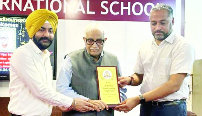 School Management presenting memento to Chief Guest Vijay Bakaya during a programme on Saturday.