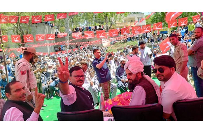NC leader Javed Rana addressing public meeting in Doongi area of Rajouri.