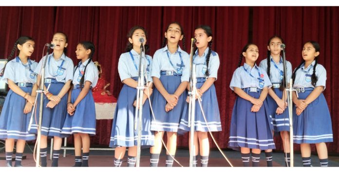Students of Humanity Public School presenting a group song during 44th Foundation Day at Jammu on Tuesday.