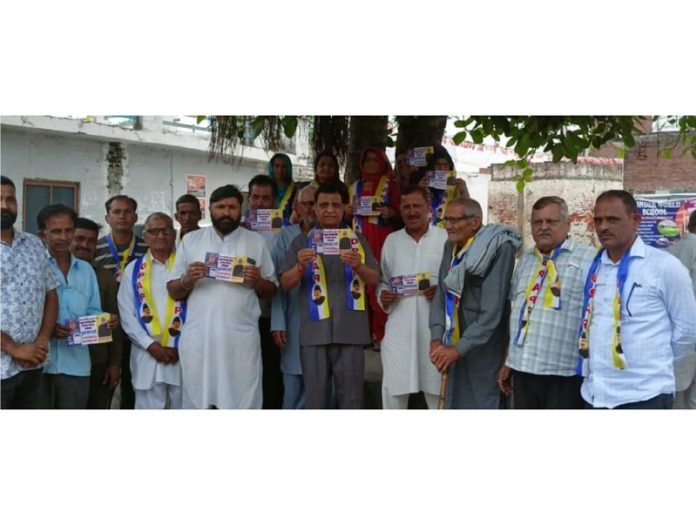 Advocate Maheshwar Singh Manhas campaigning for Saroori in Kathua.