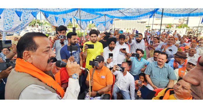 Union Minister Dr. Jitendra Singh addressing one of the series of public meetings during election campaign in Kathua city on Sunday.