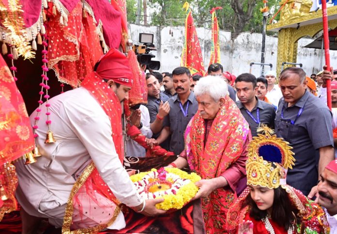 LG Manoj Sinha during ‘Pratham Pooja’ at Kol Kandoli temple in Nagrota on Sunday.