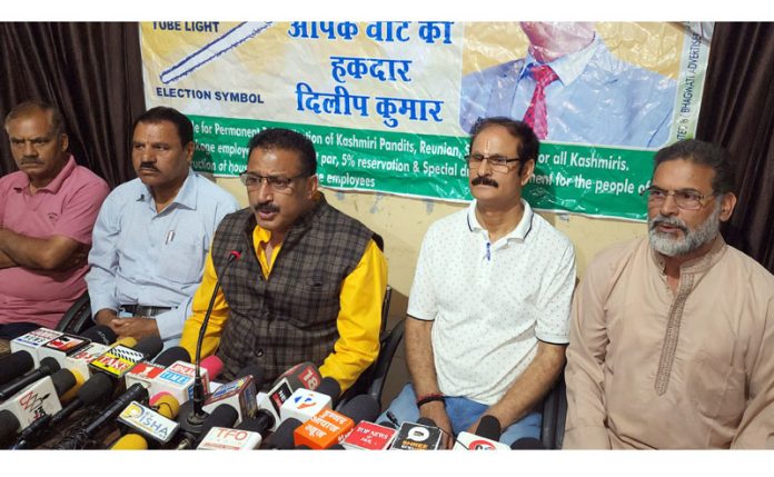 Dilip Kumar Pandita, independent candidate from Anantnag, addressing a press conference along with his supporters at Jammu on Saturday. -Excelsior/Rakesh