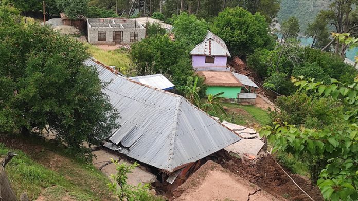 Houses damaged in Ramban village. -Excelsior/Parvaiz Mir