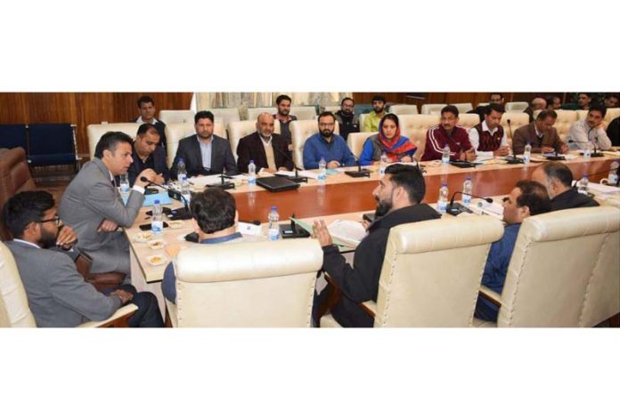 RO Srinagar PC Dr Bilal Mohi-ud-Din chairing a meeting on Sunday.