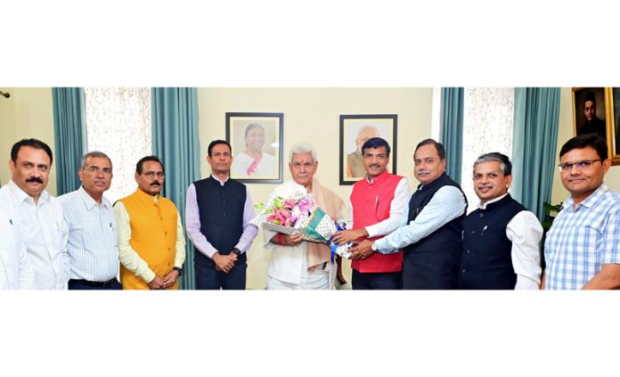 Chairman & MD, PGCIL R.K Tyagi and others during meeting with LG Manoj Sinha at Jammu.