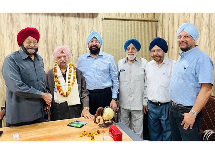 Eminent Radiologist, Dr. Inder Singh along with others posing for a photograph at a function in Jammu on Saturday.