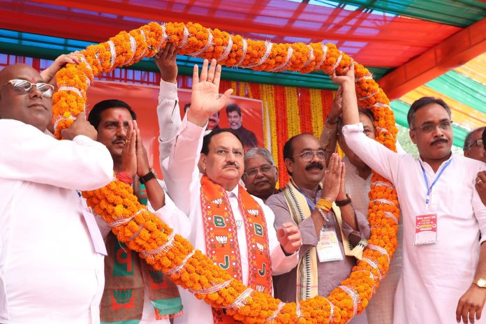 BJP National President JP Nadda being garlanded during a public meeting for Lok Sabha elections, in Lormi, Chhattisgarh on Monday. (UNI)