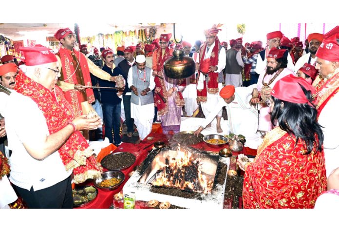 CEO Shrine Board Anshul Garg and others performing Purnaahuthi as Shat Chandi Maha Yagya concludes at Mata Vaishno Devi shrine.