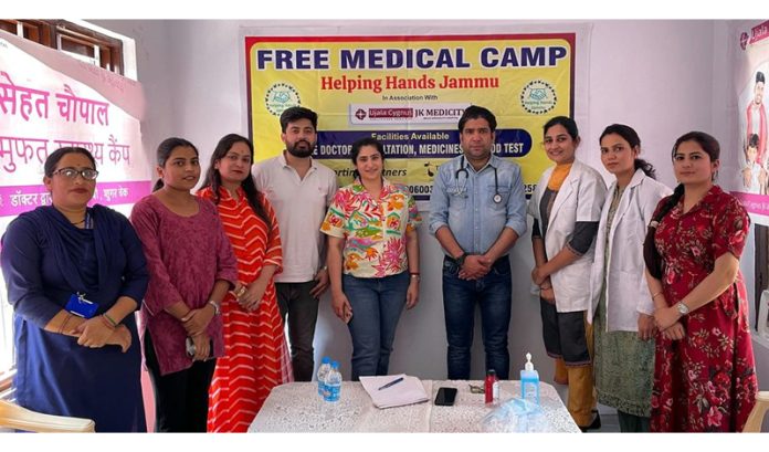 Kashish Gupta, CEO, Talla Jewellers posing along with the medical team during a camp organised in Jammu on Monday.