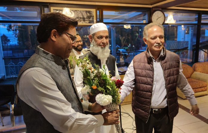 Manzoor Wangnoo, Chairman, NLCO getting 3rd Green Chandigarh Award during a function held in Srinagar on Friday.