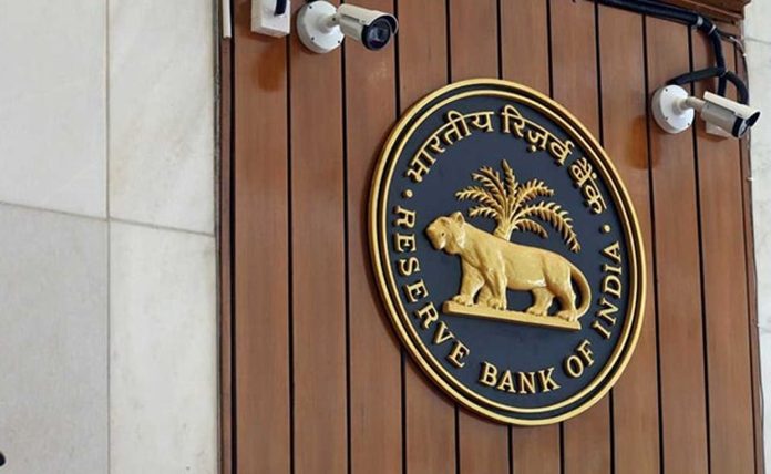 RBI bars Kotak Mahindra Bank from onboarding customers online, issuing credit cards