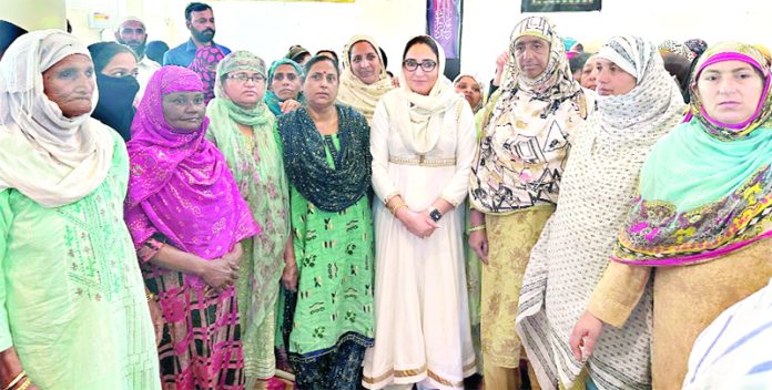 Waqf Board Chairperson Dr Darakhshan Andrabi flanked by members of Hussain A A Foundation and others in Jammu.