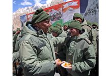 Defence Minister Rajnath Singh interacting with Army personnel during his visit to Siachen, the world’s highest battlefield, on Monday.