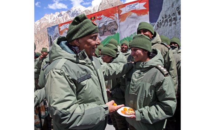 Defence Minister Rajnath Singh interacting with Army personnel during his visit to Siachen, the world’s highest battlefield, on Monday.