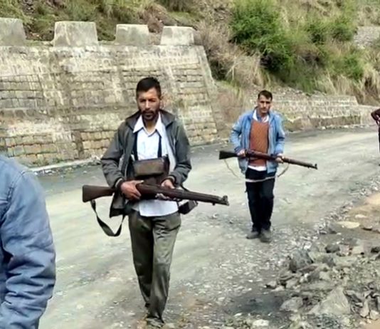 VDG members patrol an area in Basantgarh after the encounter on Sunday. -Excelsior/K Kumar