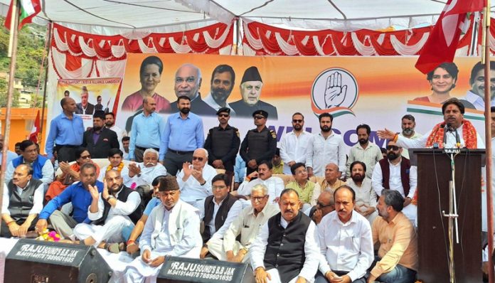 Cong candidate Raman Bhalla addressing an election rally at Katra. Former CM Dr Farooq Abdullah and senior AICC leader Bharatsinh Solanki are also seen in the picture.