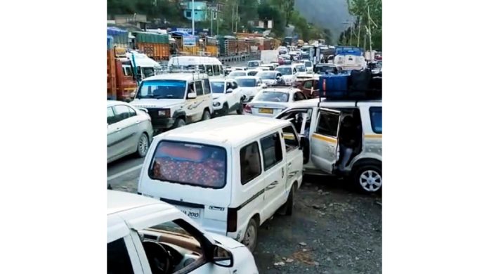 A view of traffic jam on highway near Banihal when traffic was restored on Sunday evening. - Excelsior/Parvez Mir