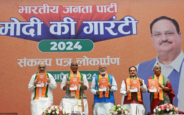 Prime Minister Narendra Modi, Home Minister Amit Shah, Defence Minister Rajnath Singh, Finance Minister Nirmala Sitharaman and BJP president JP Nadda release the party manifesto at the party headquarters in New Delhi on Sunday.(UNI )