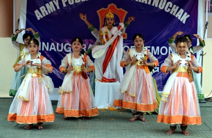 Students of Army Public School Ratnuchak presenting cultural items during a programme at school on Monday.