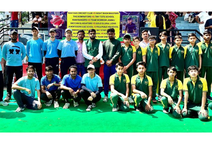 Dignitaries posing with Cricket team during an inaugural event at Jammu on Wednesday.