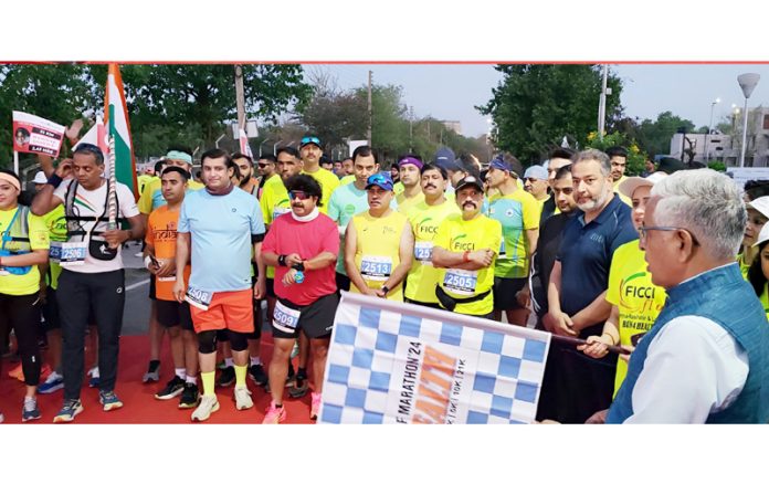 Vice Chancellor Jammu University Prof. Umesh Rai flagging off the Marathon.