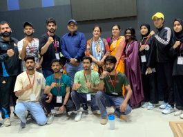 University of Kashmir players posing along with medals during All India Inter-University Qwan Ki Do tournament held in Rajasthan.