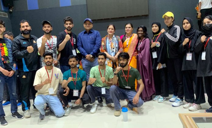 University of Kashmir players posing along with medals during All India Inter-University Qwan Ki Do tournament held in Rajasthan.