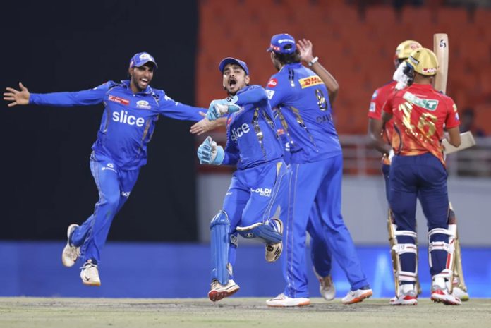Mumbai Indian players celebrating victory against Punjab Kings at Multanpur.