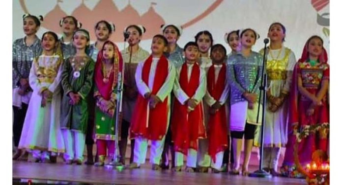 Students of BSFPS Jammu presenting a group song during Annual Day function.