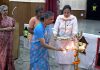 Faculty members lighting lamp during a programme in school on Thursday.