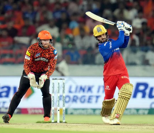 Rajat Patidar playing a brilliant shot during a match against SRH at Hyderabad.