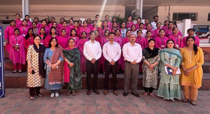 Guest speaker with staff and students of Dogra College of Education during session on career counseling.