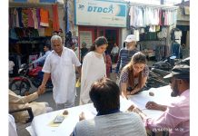 A lady putting her signature during a campaign organised by DADAA in Pacca Danga, Jammu on Tuesday.
