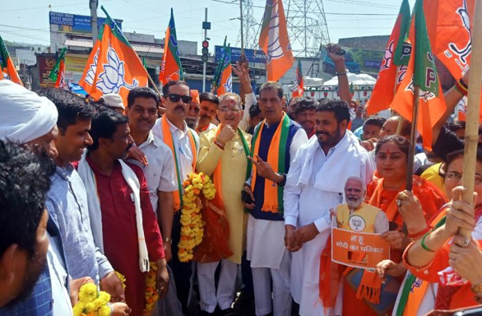 Kavinder Gupta leading a road show in support of BJP candidate Jugal Kishore Sharma in Jammu Parliamentary Constituency on Monday.