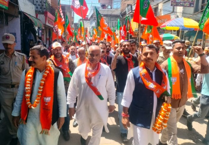 BJP leaders led by party general secretary (Org) Ashok Koul during a road show in Udhampur on Wednesday.