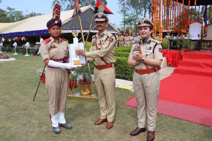 DGP RR Swain giving a memento and a certification to a pass out at PTS Kathua on Monday.