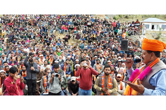 Union Minister Dr Jitendra Singh addressing a mammoth public meeting at village Bonjwah during his election campaign in the upper reaches of district Kishtwar in areas like Kuntwara, Dachhan, Marwah, Warwan etc on Friday.