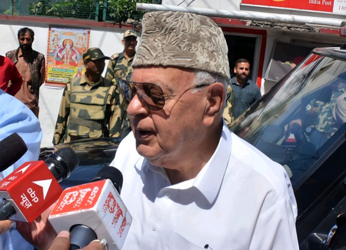 Dr Farooq Abdullah talking to reporters at Jammu on Tuesday. —Excelsior/Rakesh