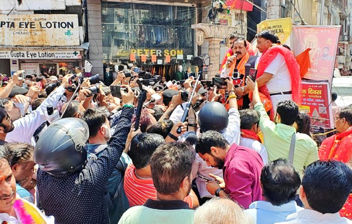 Union Minister Dr. Jitendra Singh addressing a mega road show at City Chowk Jammu on Monday.