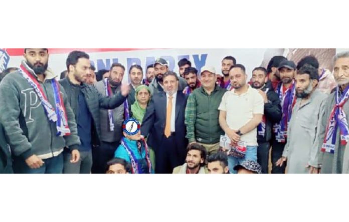 Apni Party president, Altaf Bukhari, flanked by other leaders, welcoming new entrants into party fold at Srinagar on Saturday.