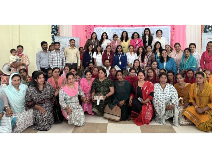 Members of FICCI FLO JKL with women artisans during Basohli retreat.