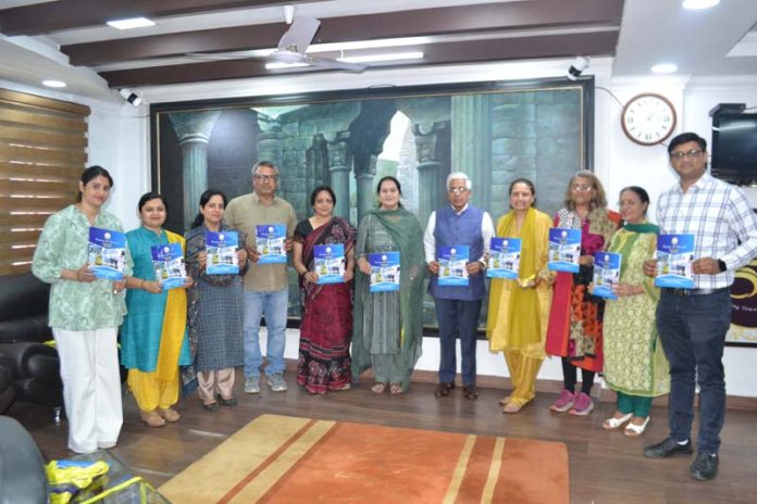 JU VC and others releasing brochure of Lifelong Learning Department on Thursday.