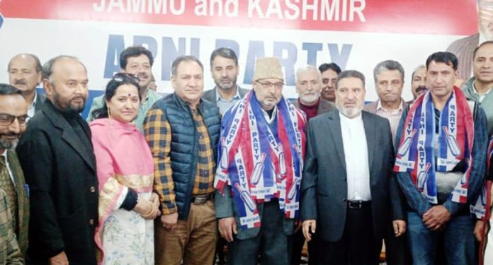 Apni Party leaders Altaf Bukhari, GH Mir and others welcoming new entrants into party fold in Srinagar.