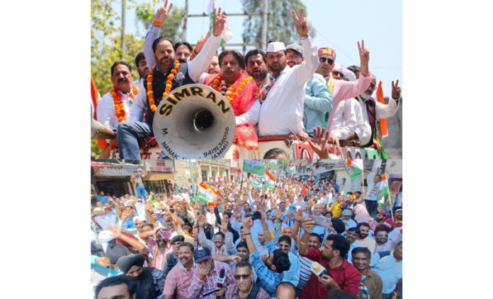 Senior Congress leaders B S Solanki, Vikar Rasool Wani, Raman Bhalla and others taking out grand road show on last day of campaign in Jammu. —Excelsior/Rakesh