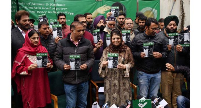 PDP president and other leaders releasing manifesto for the 2024 Lok Sabha elections at party hqrs in Srinagar. -Excelsior/Shakeel