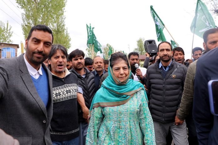Mehbooba Mufti during road show in Pulwama. -Excelsior/Younis Khaliq