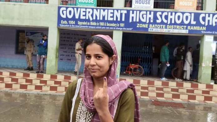 First time voter displaying ink mark after casting her vote in Ramban. -Excelsior/Parvez Mir