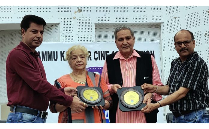 Artistic icons, Tillottma Jamwal and Raghunandan Bali being honoured by JKCA during a function at Jammu.