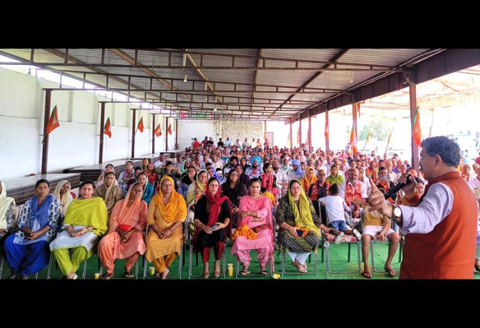 BJP candidate from Jammu Lok Sabha constituency, Jugal Kishore Sharma addressing an election rally in a border village of Jammu on Wednesday.